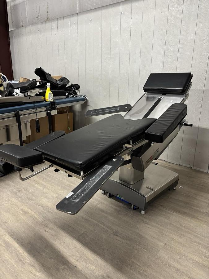 Used AMSCO 2080 manual surgical table And Pads And Attachments