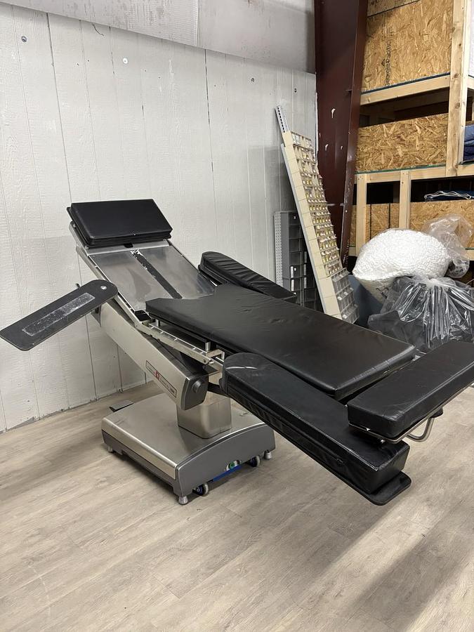 Used AMSCO 2080 manual surgical table And Pads And Attachments