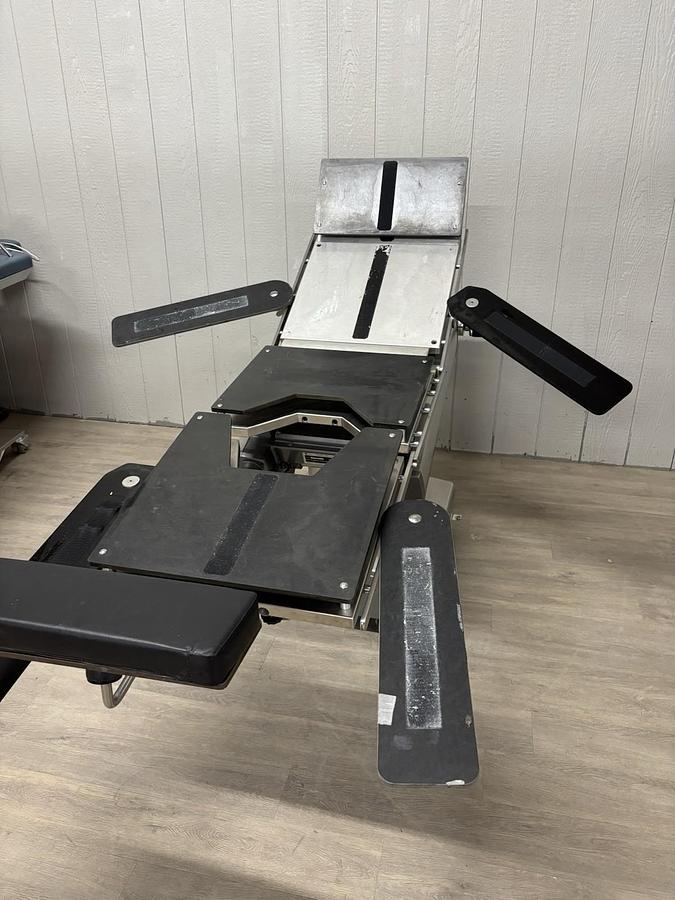 Used AMSCO 2080 manual surgical table And Pads And Attachments