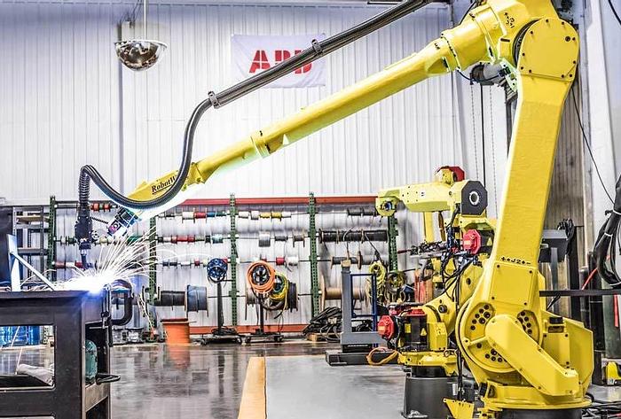 Used LINCOLN SYSTEM 55 WITH FANUC M710iC/20L MIG WELDING ROBOT A/B SIDED INDEX TABLE