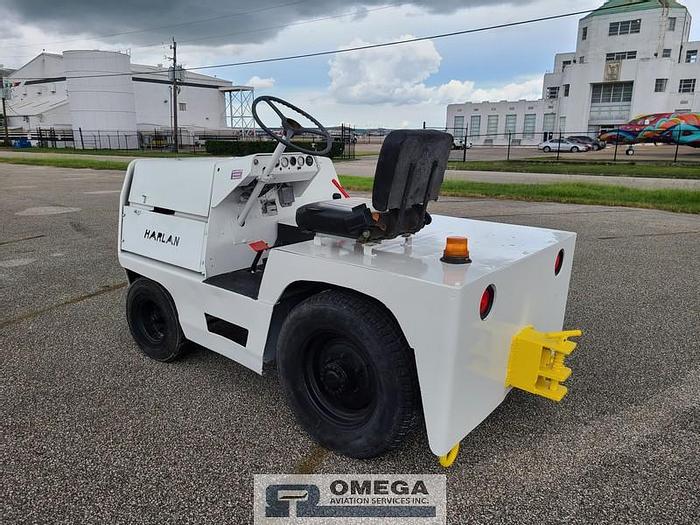 Used 2001 Harlan HTAG-50, baggage tow tractor.