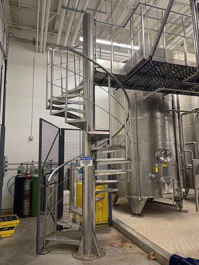 Used Letina Stainless spiral staircase and catwalk platform designed for overhead tank access
