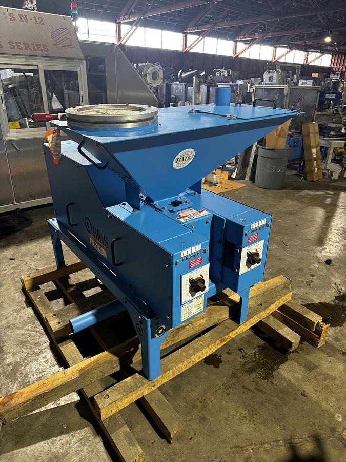 Used RMS 2 roll mill with bulk/super sack frma and infeed attachment