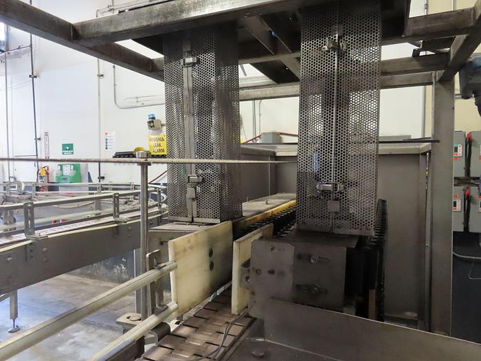 Used (1) Used Sentry Low Level Gripper style bottle rinser