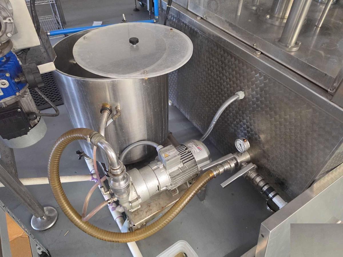 Used Used GAI 3003A Bier 12 valve counter pressure filling line