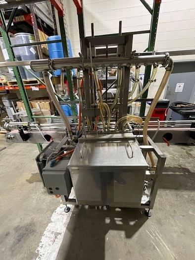 Used MRM/Elgin  GR-12  -  5 Valve Pressure/Over-flow filler