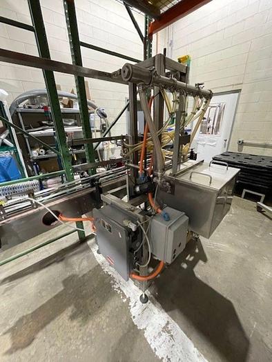 Used MRM/Elgin  GR-12  -  5 Valve Pressure/Over-flow filler