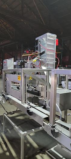 Used Reid 2 1/2 gallon filling line