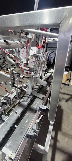 Used Reid 2 1/2 gallon filling line