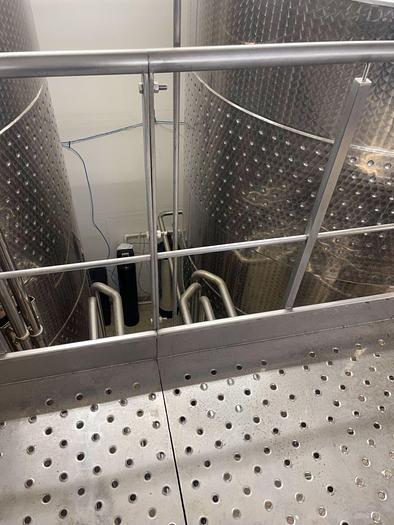 Used Letina Stainless spiral staircase and catwalk platform designed for overhead tank access