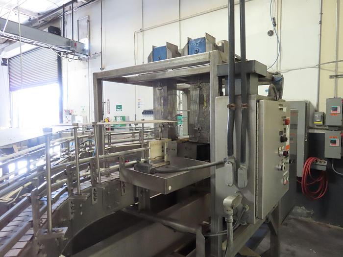 Used (1) Used Sentry Low Level Gripper style bottle rinser