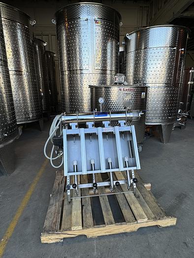 Used Used Criveller manual carbonated bottle filler - 4 head