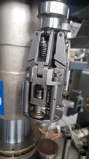 Used Bertolaso 5 head ROPP capper