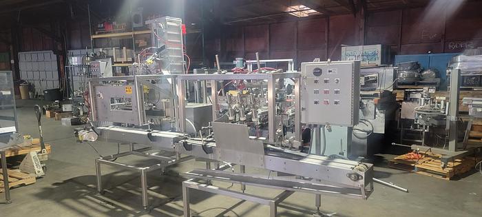 Used Reid 2 1/2 gallon filling line