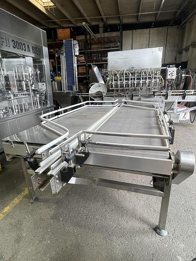 Used Used 9' Bi-Flow Accumulation Table