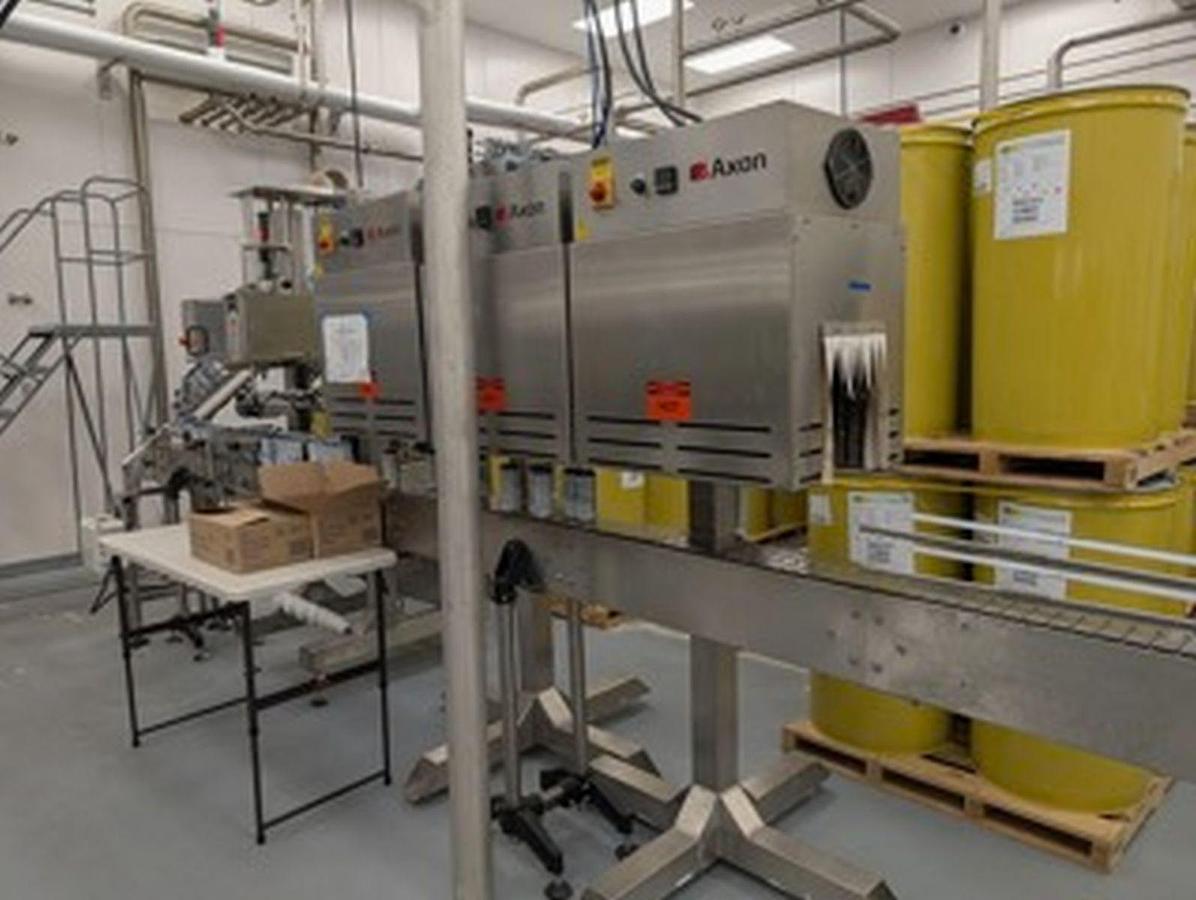 Used Used Axon EZ-150 SL sleeve labeler / neck bander and tunnel