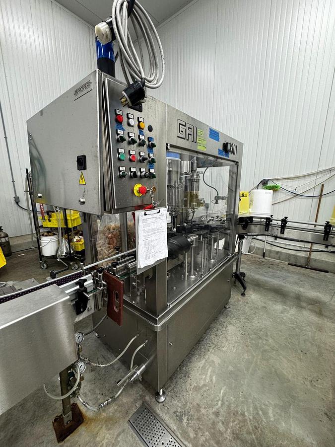 Used Used GAI 1301 Monoblock filling line for non carbonated beverage products