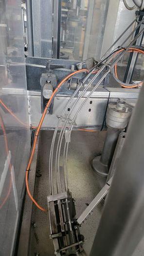 Used Bertolaso 5 head ROPP capper
