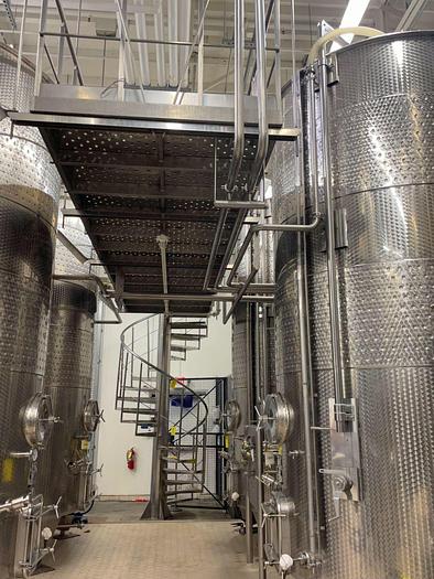 Used Letina Stainless spiral staircase and catwalk platform designed for overhead tank access