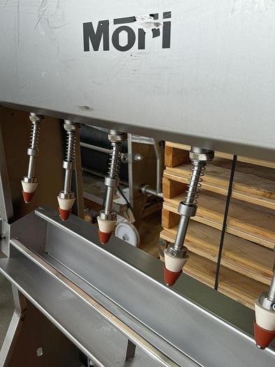 Used Used Mori 6 spout gravity filler