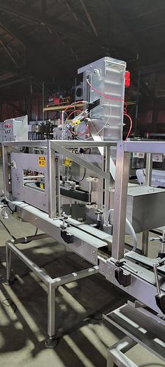 Used Reid 2 1/2 gallon filling line