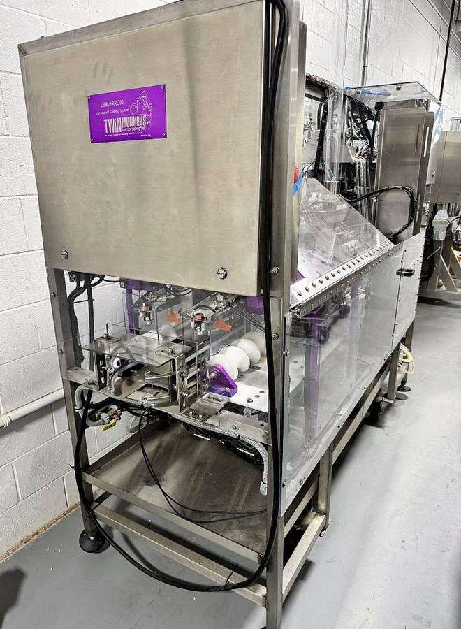 Used Used Twin Monkeys Beverage System Cimarron 10 head dual lane Canning Line