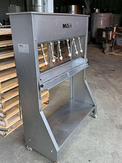 Used Used Mori 6 spout gravity filler