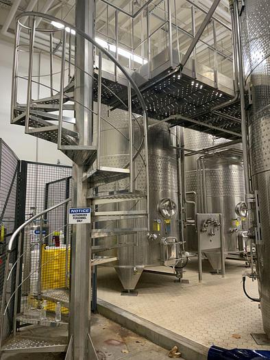 Used Letina Stainless spiral staircase and catwalk platform designed for overhead tank access