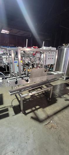 Used Reid 2 1/2 gallon filling line