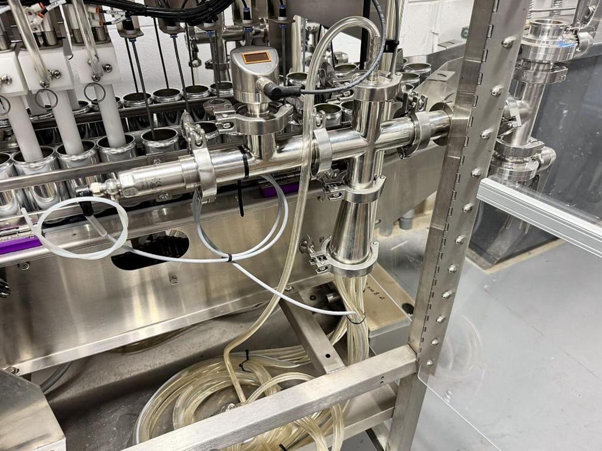 Used Used Twin Monkeys Beverage System Cimarron 10 head dual lane Canning Line