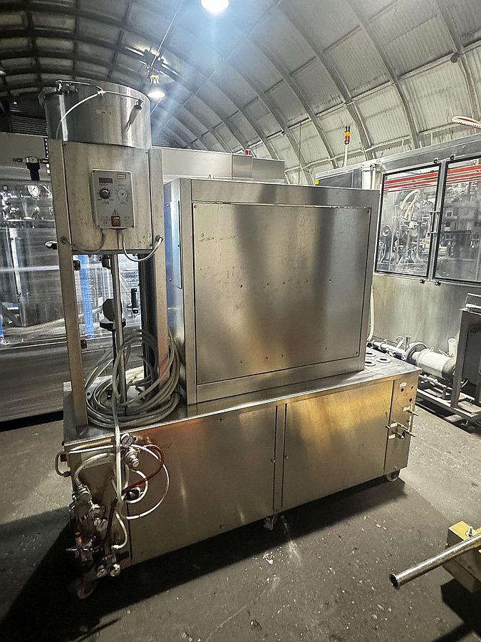 Used Used IC Filling Systems Semi Auto counterpressure bottle filler/ crowner