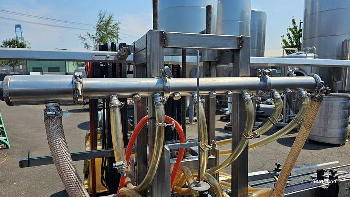 Used MRM/Elgin  GR-12  -  5 Valve Pressure/Over-flow filler