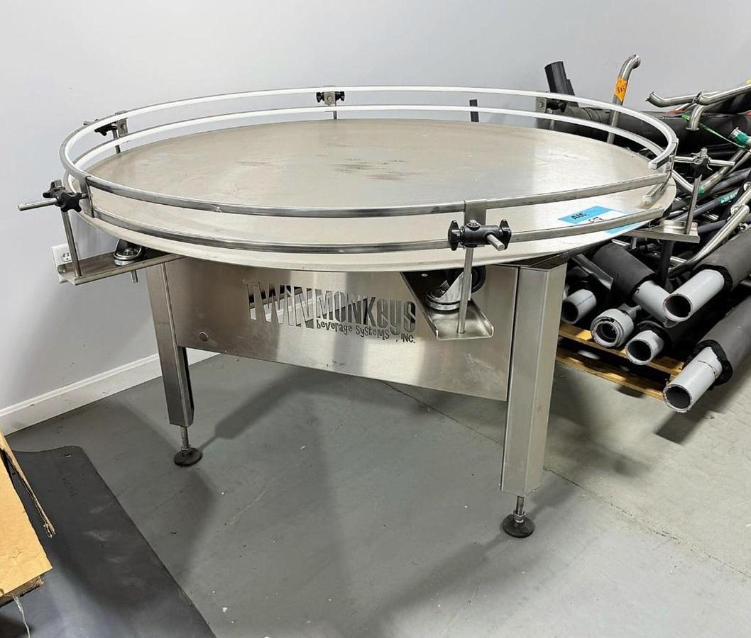 Used Twin Monkey Canning 60" accumulation/pack off disc
