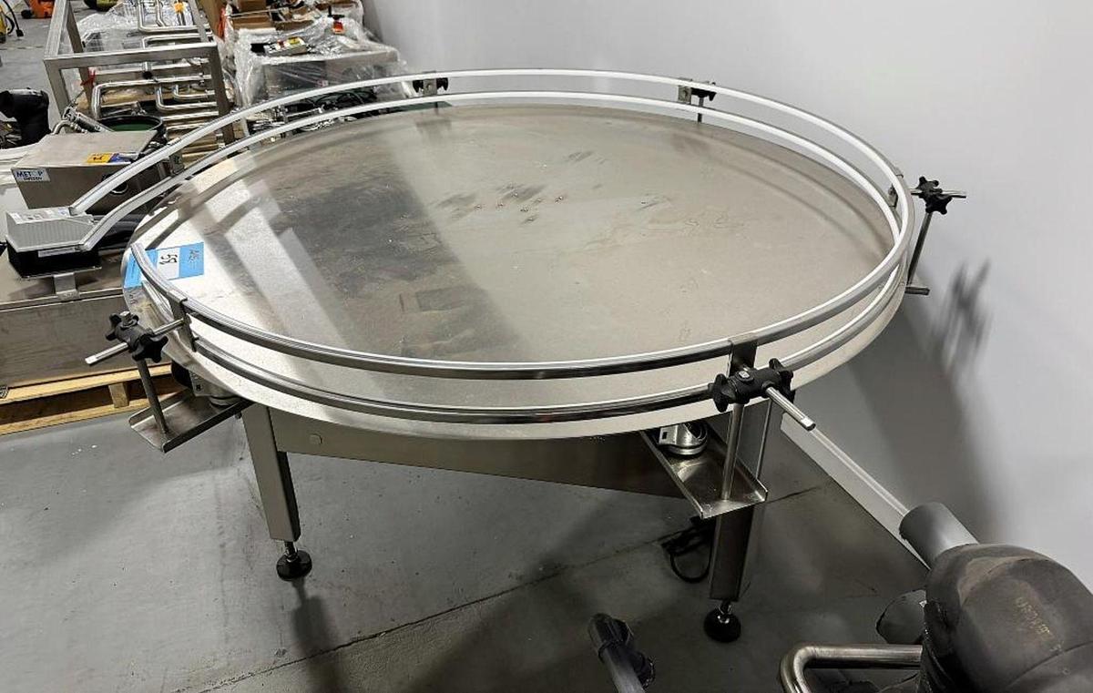 Used Twin Monkey Canning 60" accumulation/pack off disc