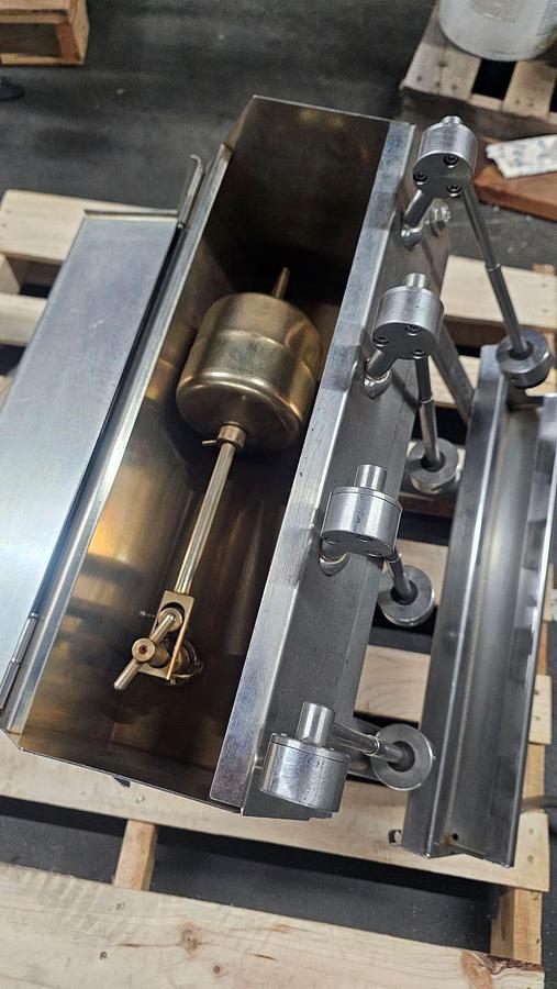 Used Used-GAI 4 Head Table Top Manual Gravity filler