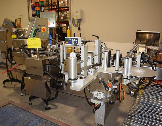 Used NJM Packaging Pressure Sensitive Labeler