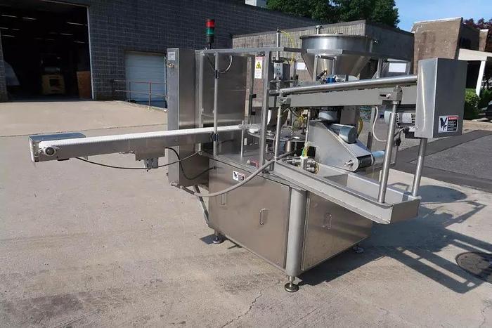 Used Orics R50 Rotary Cup filling, Sealing and Lid Applying Line