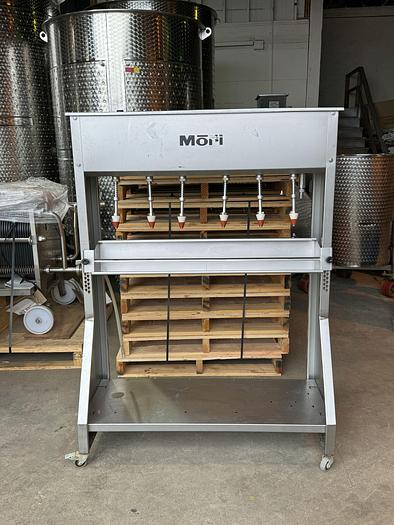 Used Used Mori 6 spout gravity filler