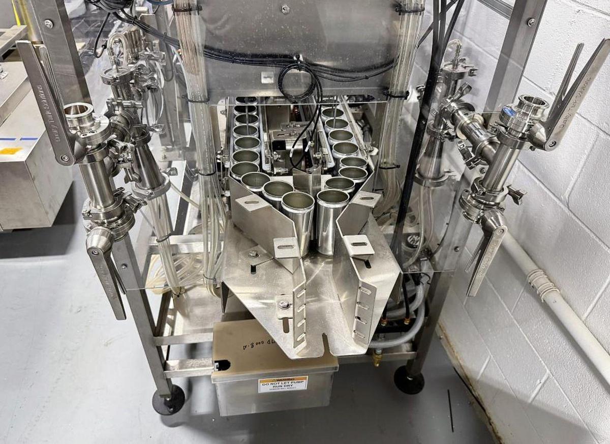 Used Used Twin Monkeys Beverage System Cimarron 10 head dual lane Canning Line