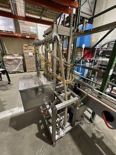 Used MRM/Elgin  GR-12  -  5 Valve Pressure/Over-flow filler