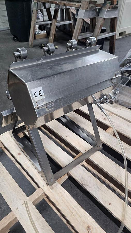Used Used-GAI 4 Head Table Top Manual Gravity filler