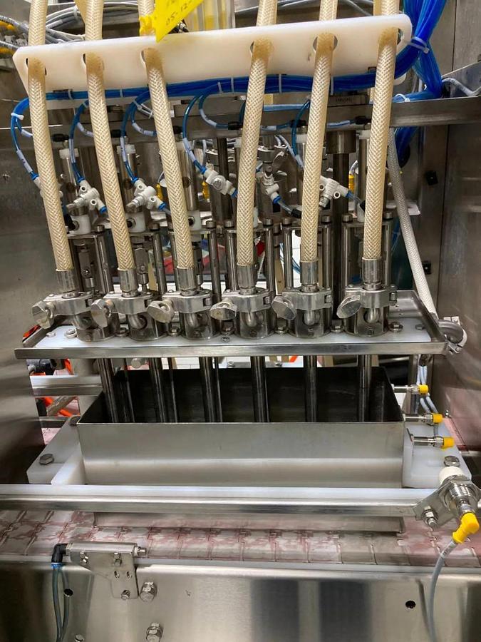 Used Used Pneumatic Scale/Angelus CB50F 6 head can filler/seamer