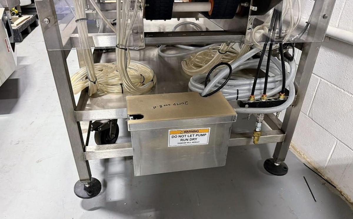 Used Used Twin Monkeys Beverage System Cimarron 10 head dual lane Canning Line