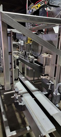 Used Reid 2 1/2 gallon filling line