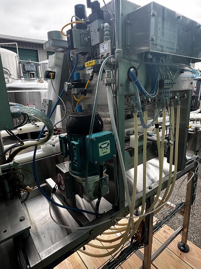 Used Used Pneumatic Scale/Angelus CB50F 6 head can filler/seamer