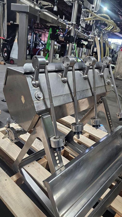 Used Used-GAI 4 Head Table Top Manual Gravity filler