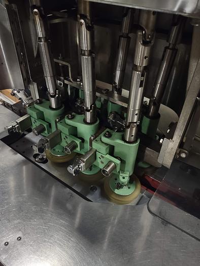 Used Resina U-30 Stainless steel base capper