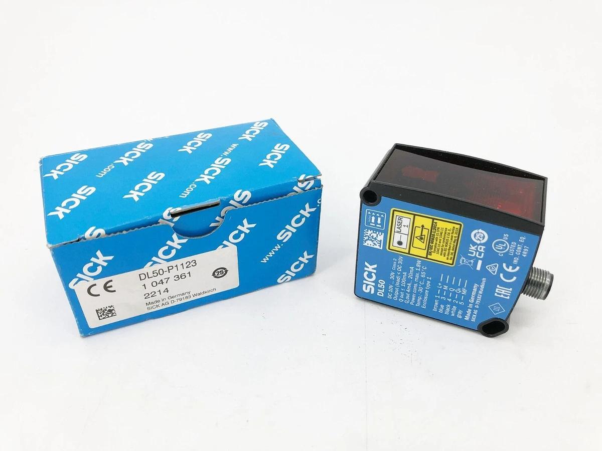 New Sick DL50-P1123 Distance Sensor 200-50000mm Range 10-30VDC
