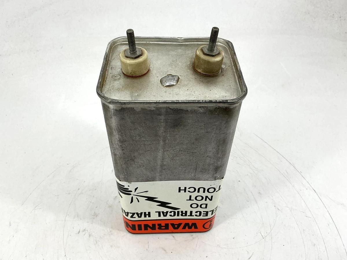 Used NWL Capacitors 11377 Capacitator Capacitance: 35mfd+-10% Voltage: 2.5KVDC