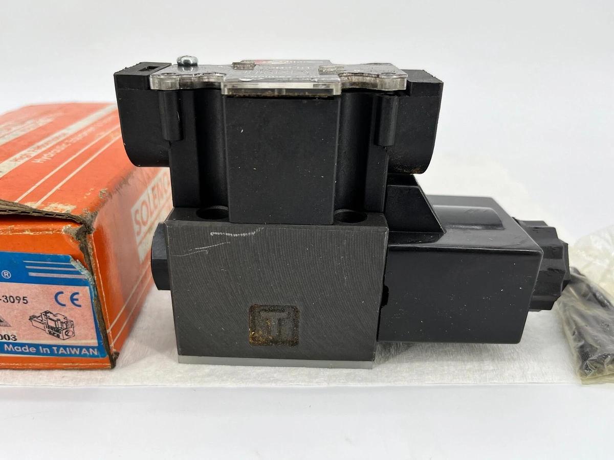 Used Hystar Canimex DSG-2B2-01-A110 Hydraulic Solenoid Valve - missing cover screws